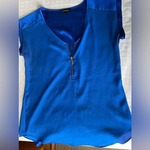Express size small beautiful flattering blue blouse with gold zipper.